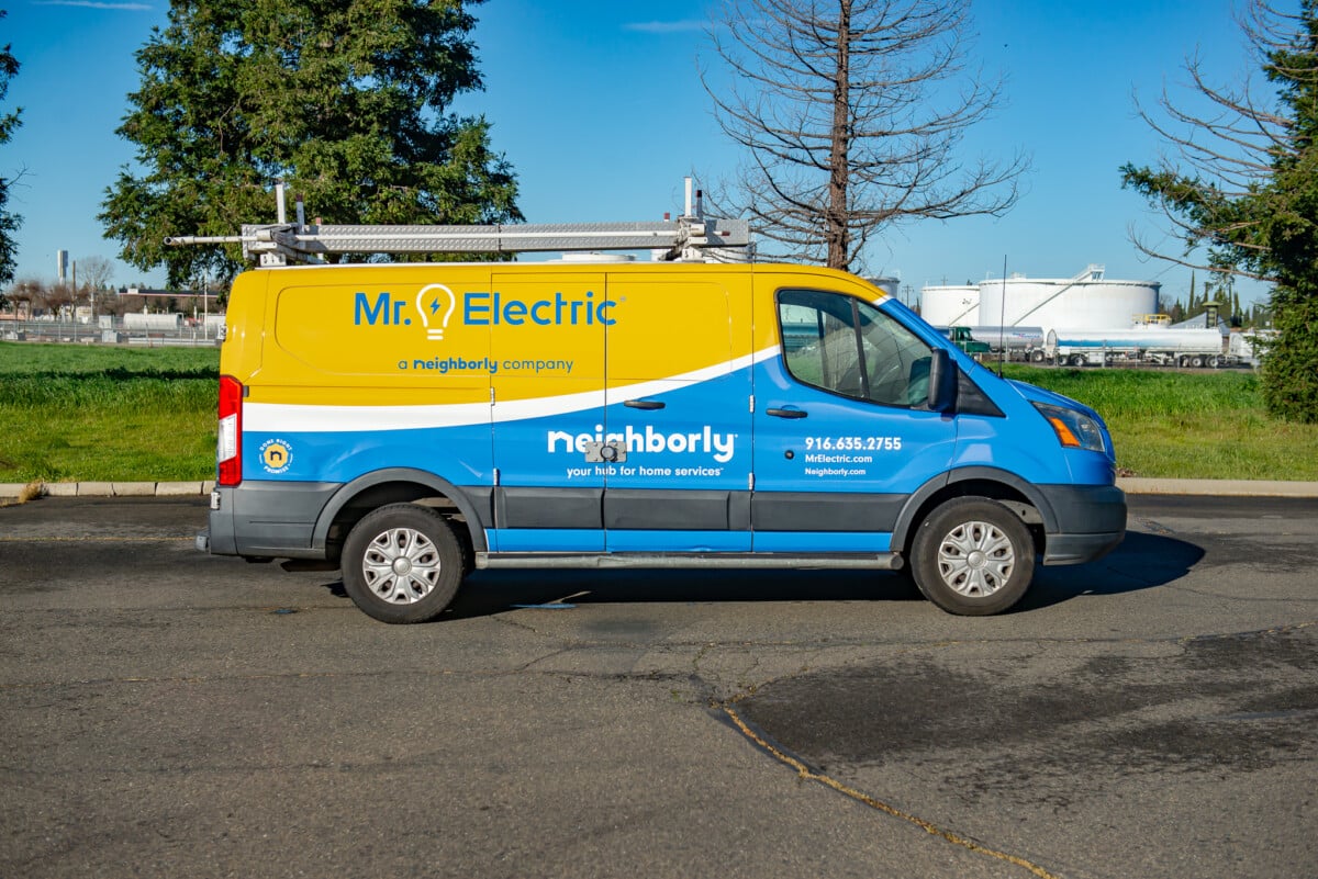 Business truck featuring full-color graphics after vinyl wrap installation by ProWraps Inc. 