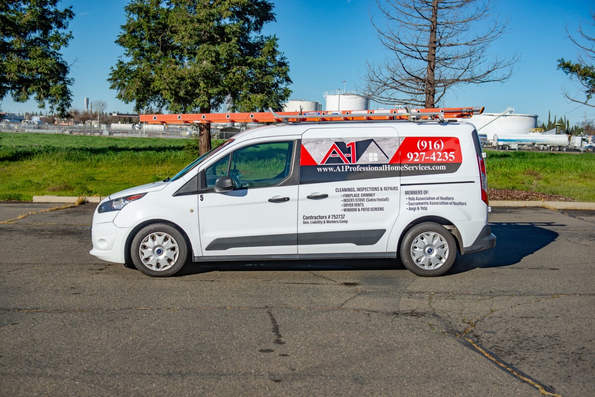 Branded van featuring their contact information, services, and their company logo on vehicle wrap. 