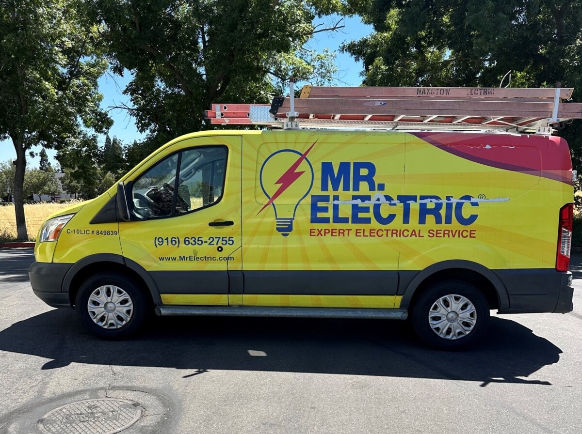 Branded fleet can featuring contact information and graphics after wrap installation by ProWraps Inc. 