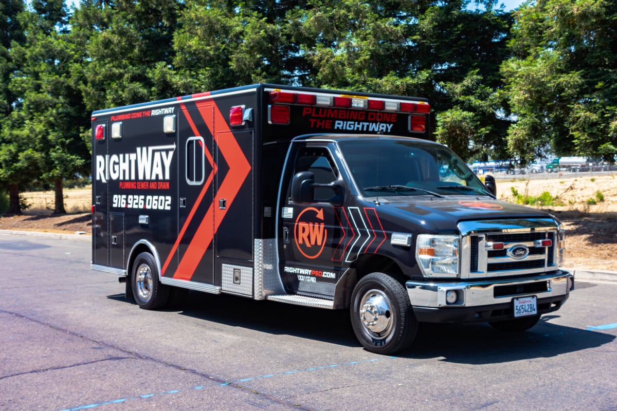 Custom plumbing van wrap created by Pro Wraps to boost brand visibility